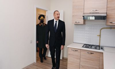 İlham Aliyev, MİDA’nın yaptırdığı binalarda şehit aileleri ve askerlerin kaldığı apartmanlarla tanıştı